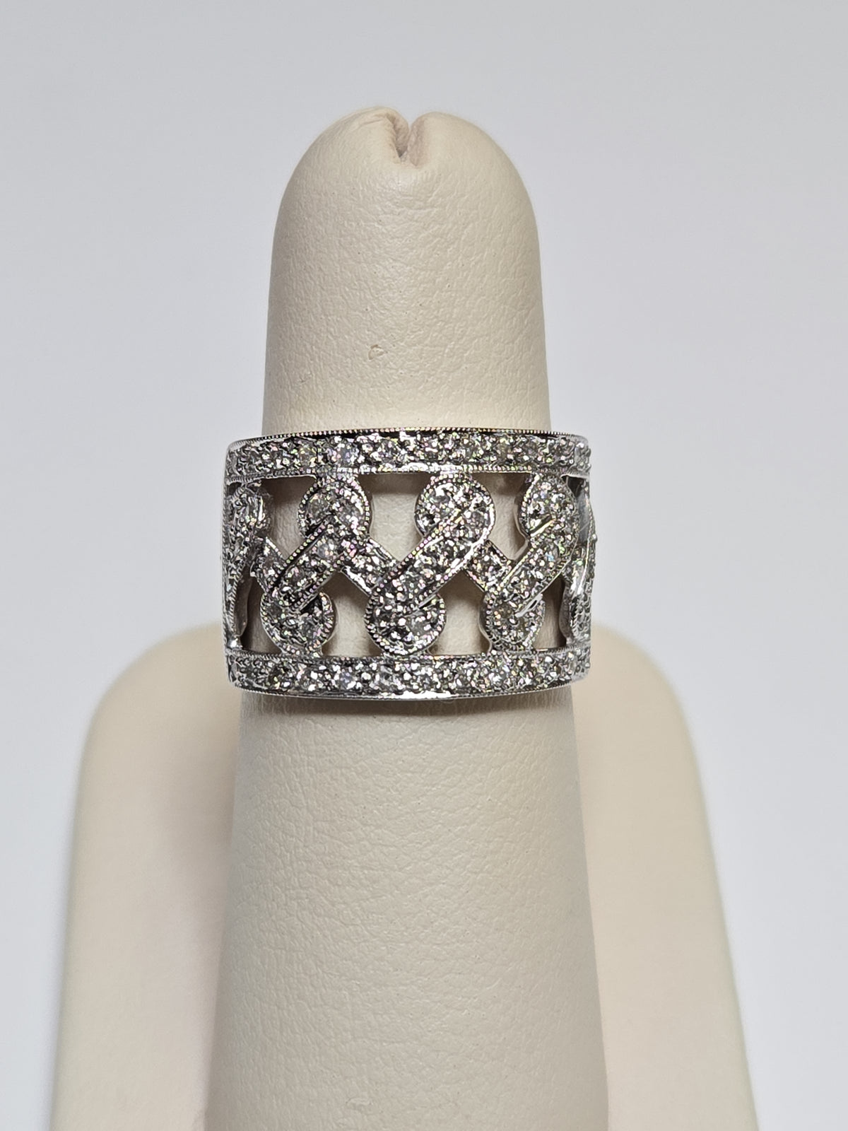 14K white gold ring with 0.5ct round diamonds, elegant jewelry piece from Chique Jewelry, showcasing a sparkling gemstone design.