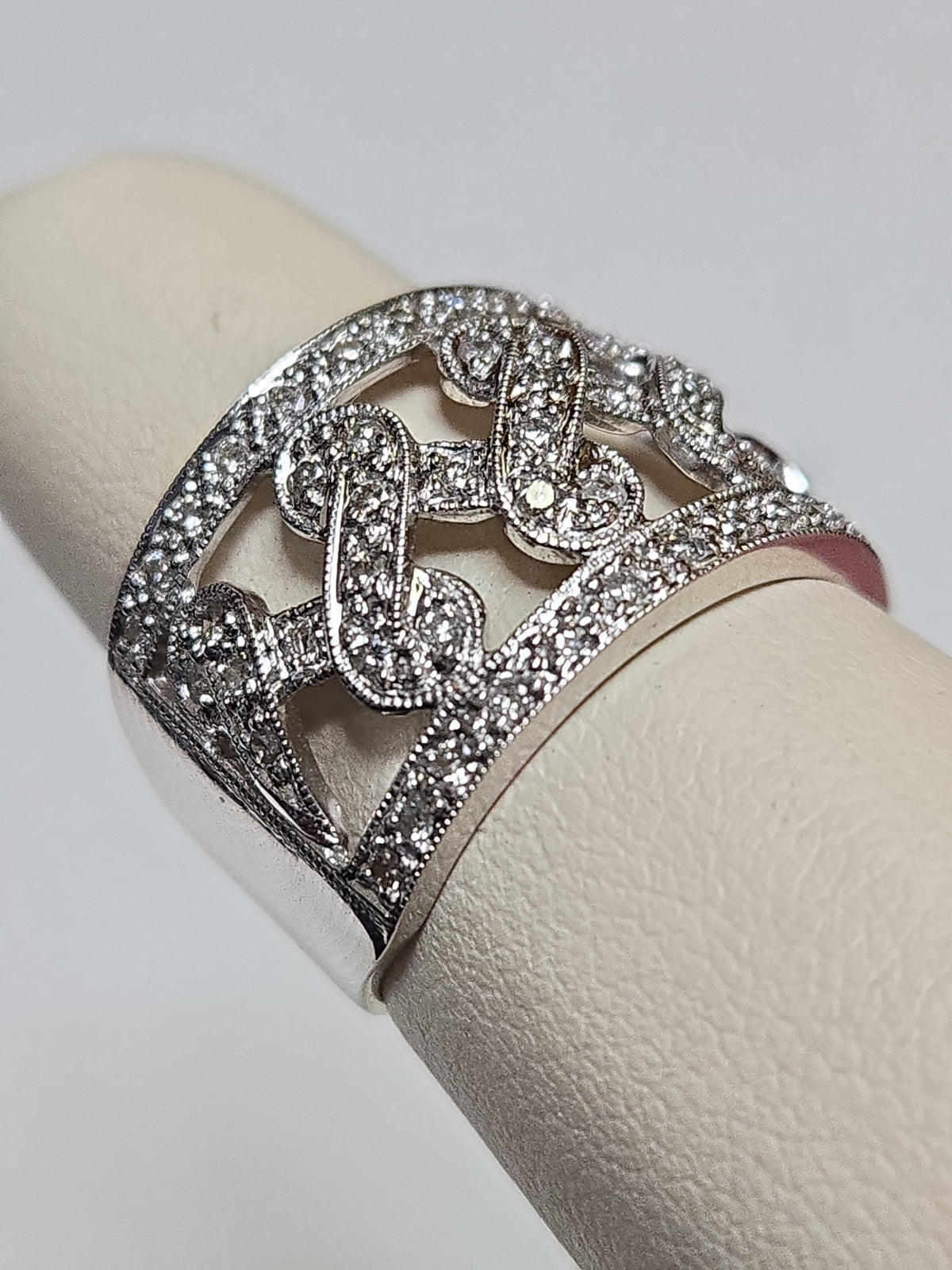 14K white gold ring with 0.5ct round diamonds from Chique Jewelry, showcasing the elegant design and sparkling stones.