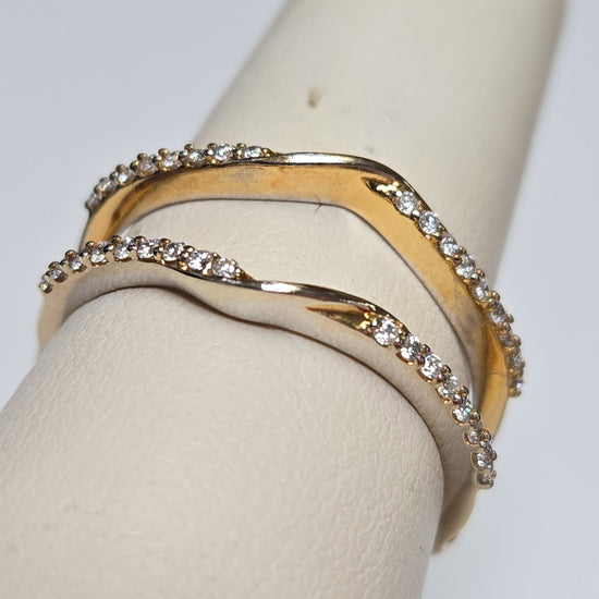 14K gold ring with 0.33ct round diamonds from Chique Jewelry, featuring a sleek design and sparkling gemstone accents.