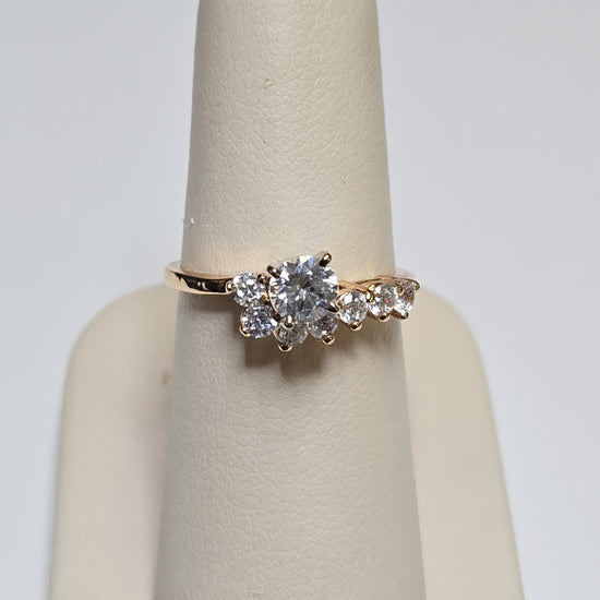 14K gold engagement ring with round simulated Lannyte diamond, featuring a sleek design and 3.1g weight by Chique Jewelry