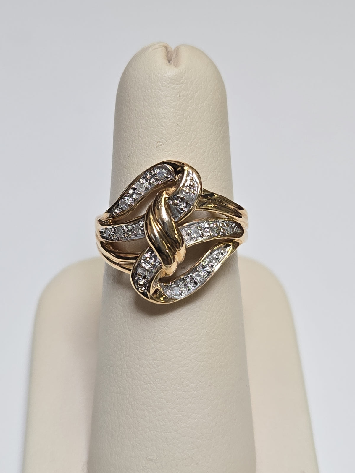 10K gold ring with 0.3ct round diamonds and a sleek band, crafted by Chique Jewelry.