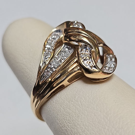 10K gold ring with 0.3ct round diamonds from Chique Jewelry, showcasing a sleek design and sparkling gemstone accents.