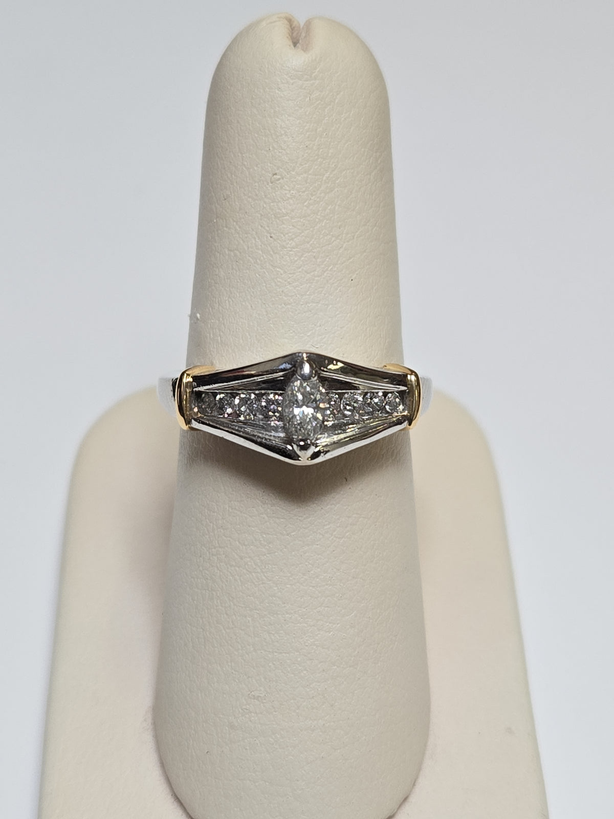 950 platinum engagement ring with filigree design and 0.5ct marquise diamond, crafted by Chique Jewelry.