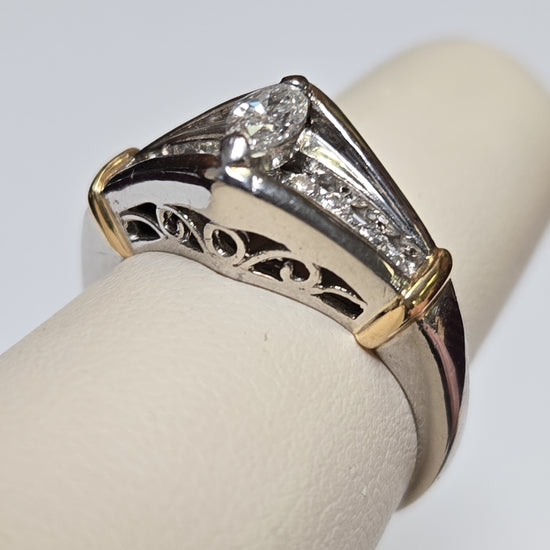 950 platinum engagement filigree ring with 0.5ct marquise diamond and intricate design, weighs 8.3 grams.