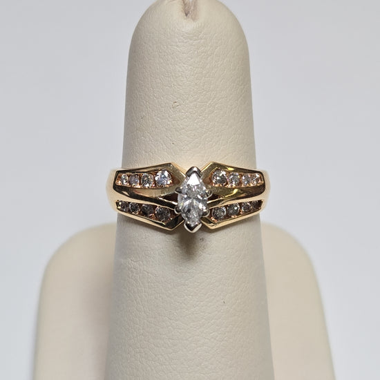 14K gold engagement ring with a 0.2ct marquise diamond, featuring elegant design by Chique Jewelry.