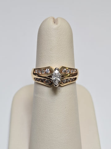 14K gold engagement ring with a 0.2ct marquise diamond, featuring elegant design by Chique Jewelry.