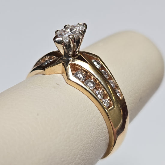 14K gold engagement ring with a 0.2ct marquise diamond, crafted by Chique Jewelry, featuring elegant design and fine craftsmanship.