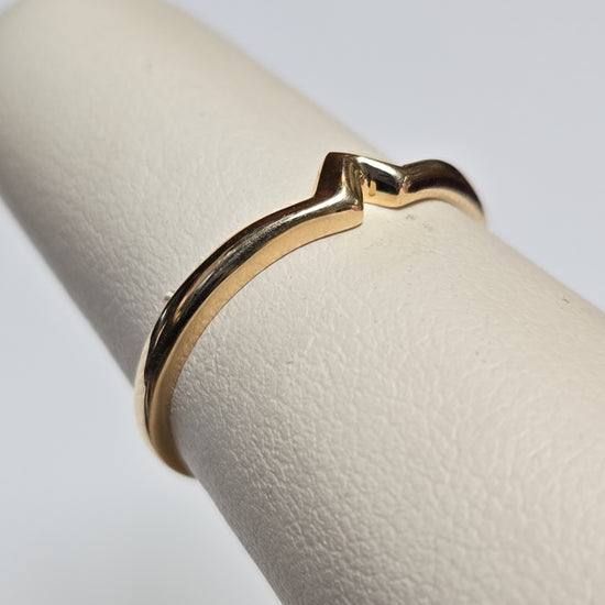 14K gold wedding ring from Chique Jewelry, 1.5g, with a polished finish and classic design, perfect for special occasions.