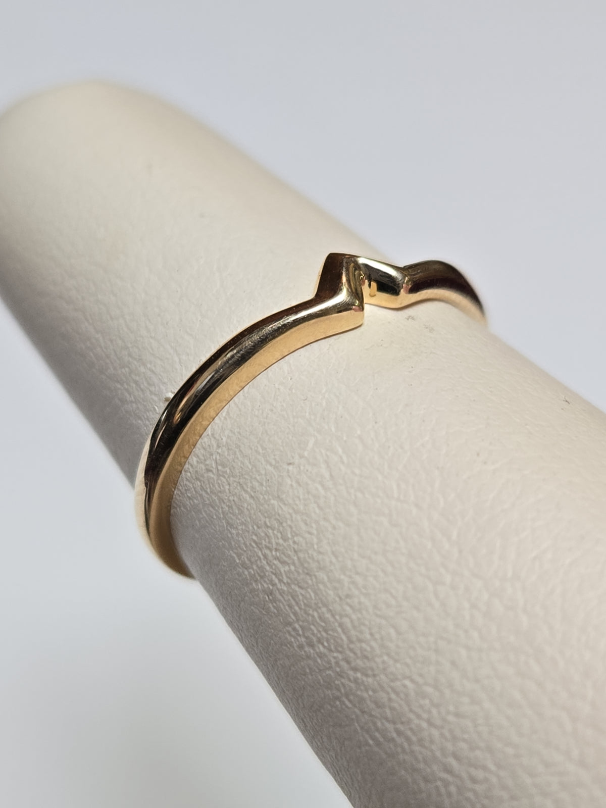 14K gold wedding ring from Chique Jewelry, 1.5g, with a polished finish and classic design, perfect for special occasions.