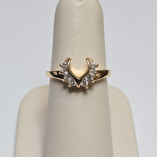 14K gold wedding ring with 0.28ct round diamonds from Chique Jewelry, featuring a polished band and sparkling gemstone accents.
