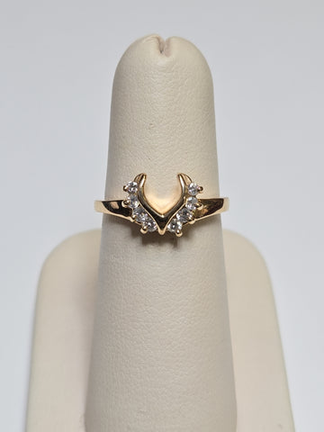 14K gold wedding ring with 0.28ct round diamonds from Chique Jewelry, featuring a polished band and sparkling gemstone accents.