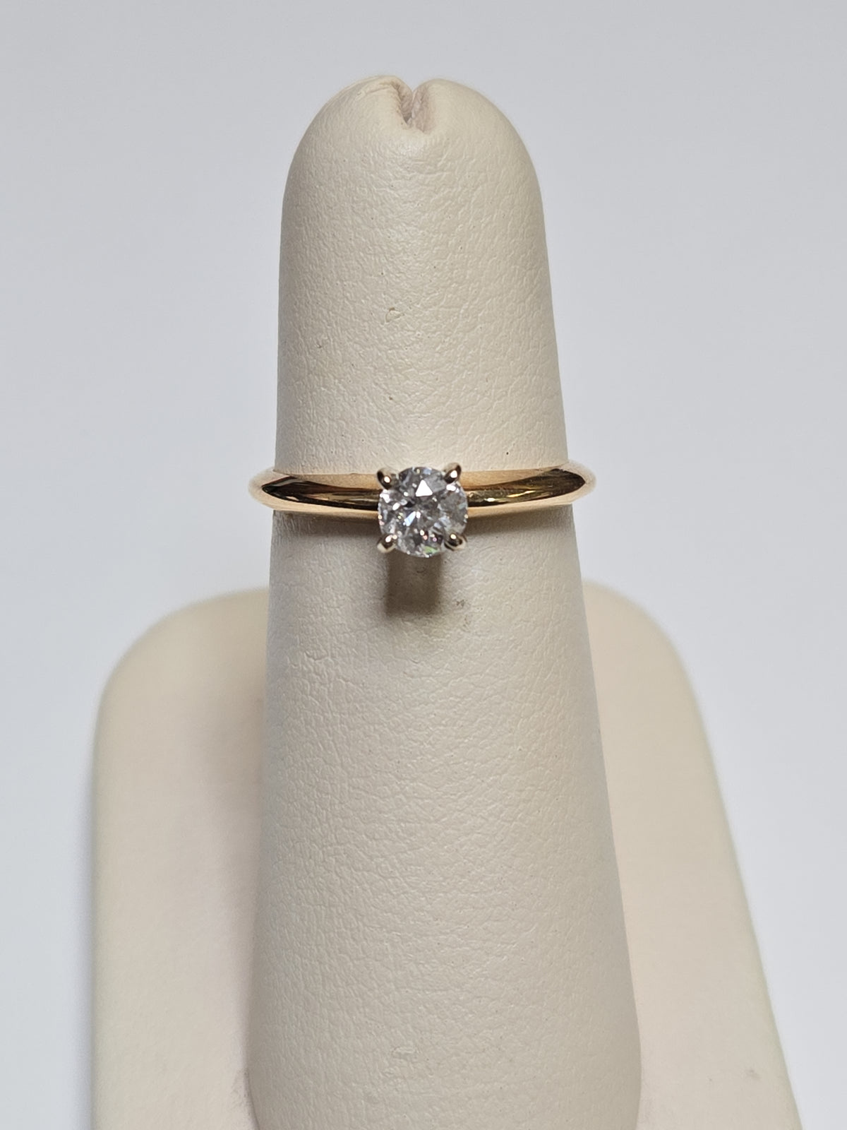 14K gold engagement ring featuring a 0.42ct round old miner diamond, crafted by Chique Jewelry.