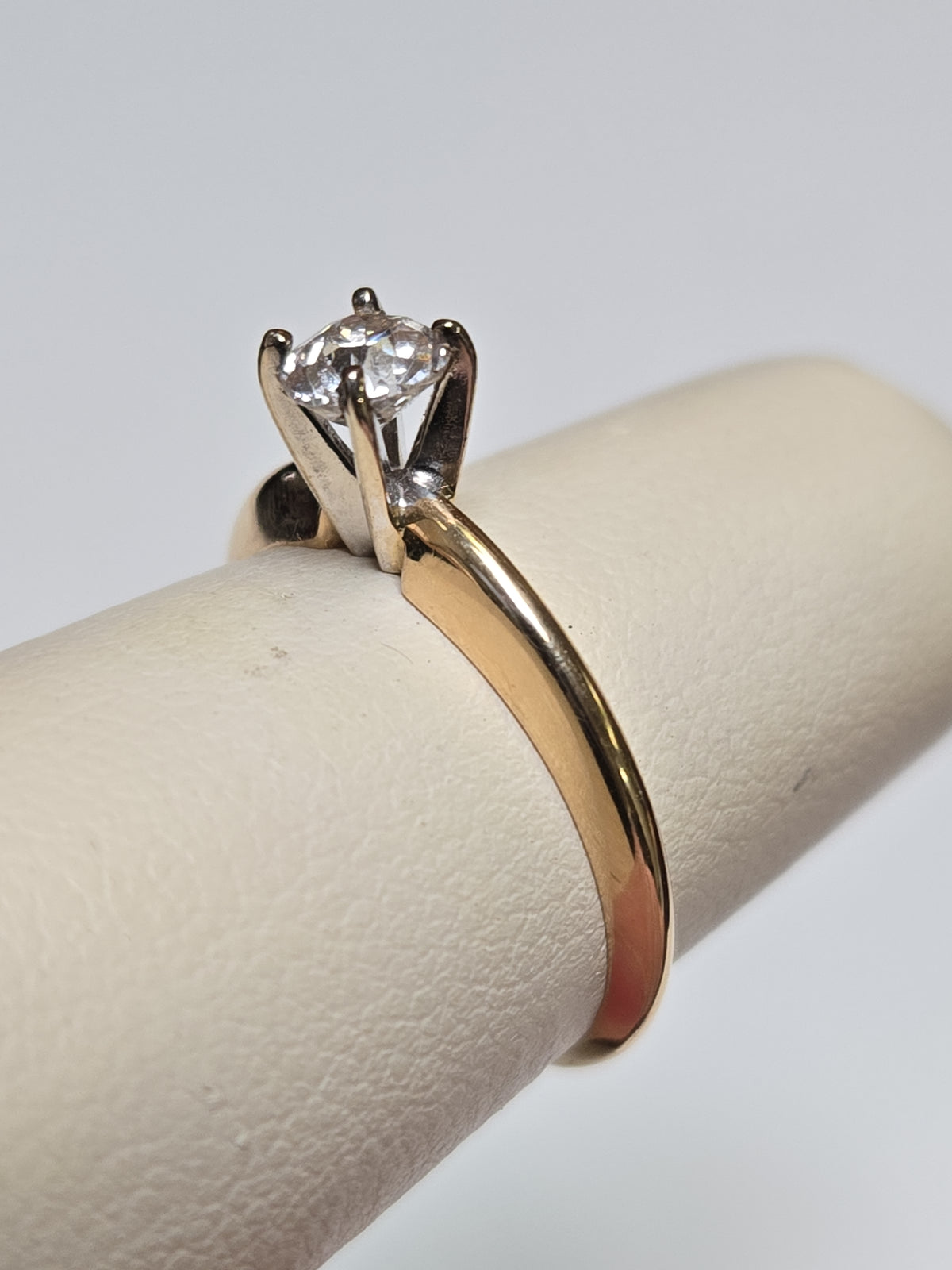 14K gold engagement ring with 0.42ct round old miner diamond, featuring a delicate band and elegant design by Chique Jewelry.