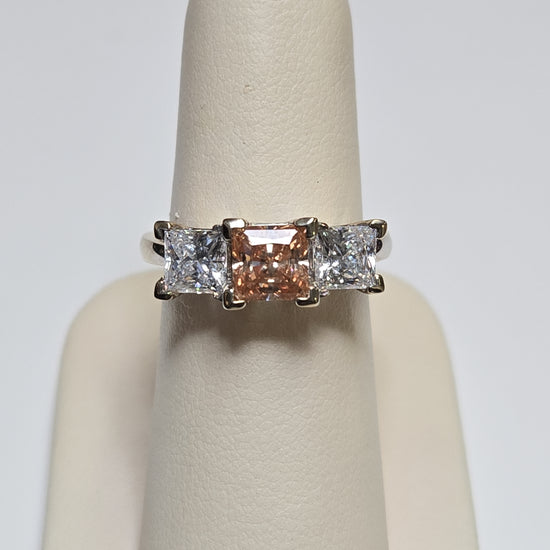 14K white gold three stone ring with princess-cut simulated Lannyte diamonds, featuring elegant design and 6.7g weight.