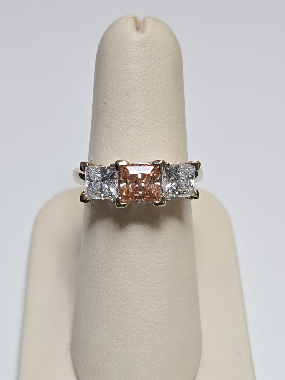 14K white gold three stone ring with princess-cut simulated Lannyte diamonds, featuring elegant design and 6.7g weight.