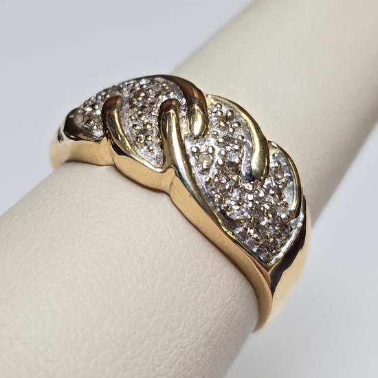 10K gold ring with 0.33ct round diamonds from Chique Jewelry, featuring a sleek design and 3.8g weight.