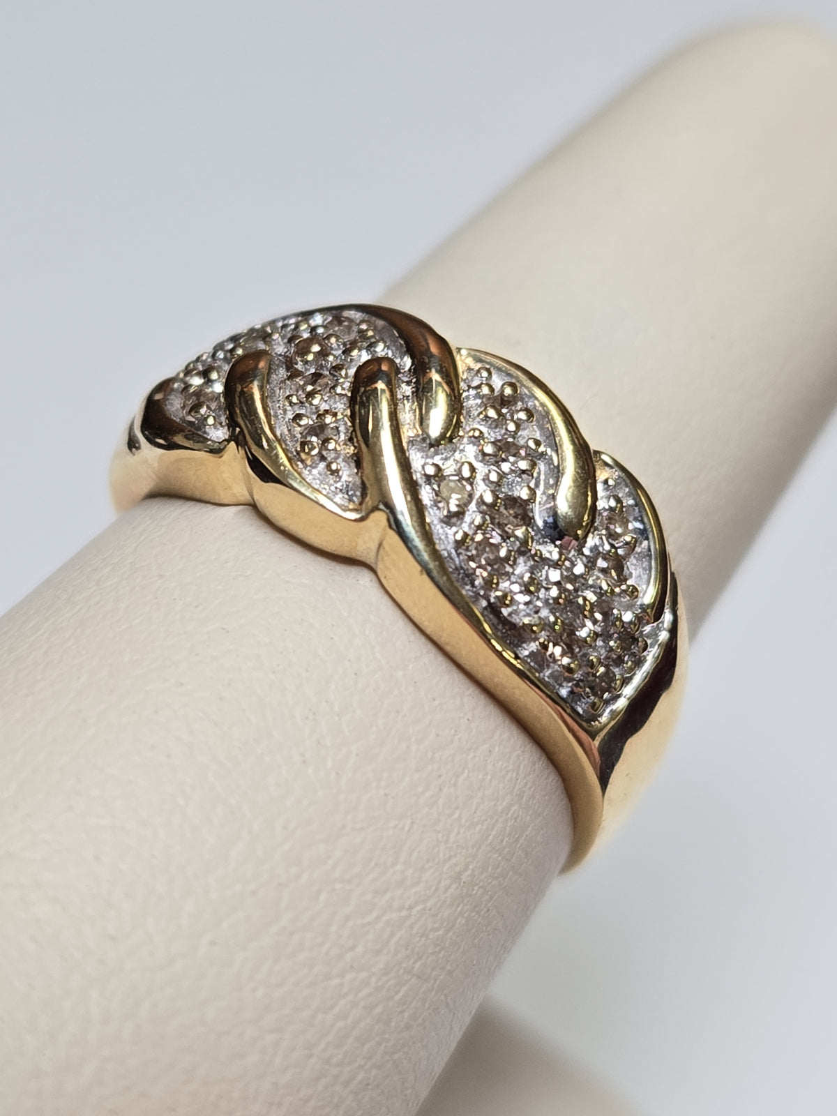 10K gold ring with 0.33ct round diamonds from Chique Jewelry, featuring a sleek design and 3.8g weight.