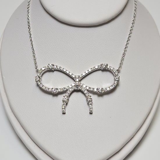 18K white gold cable chain necklace with round diamond pendant, 0.85ct, from Chique Jewelry, featuring a delicate design and polished finish.