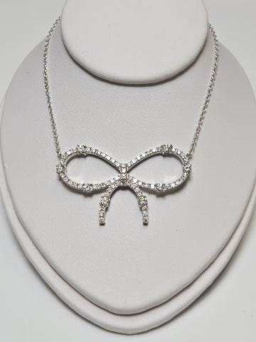 18K white gold cable chain necklace with round diamond pendant, 0.85ct, from Chique Jewelry, featuring a delicate design and polished finish.