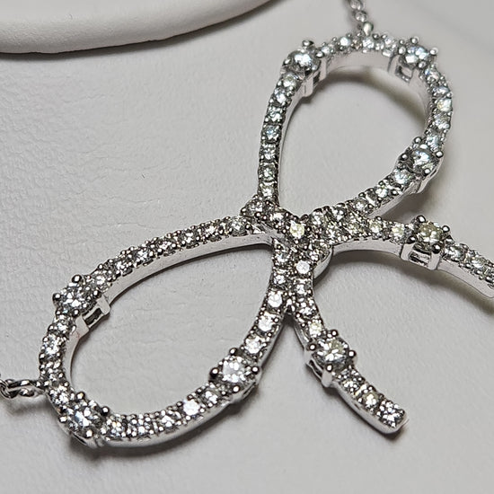 18K white gold cable chain necklace with a 0.85ct round diamond pendant, from Chique Jewelry, weighing 5.2 grams.