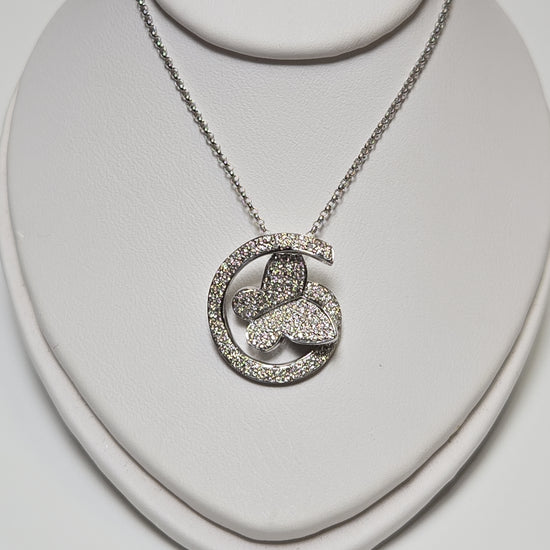 14K white gold rolo chain necklace with butterfly pendant featuring 0.41ct round diamonds from Chique Jewelry