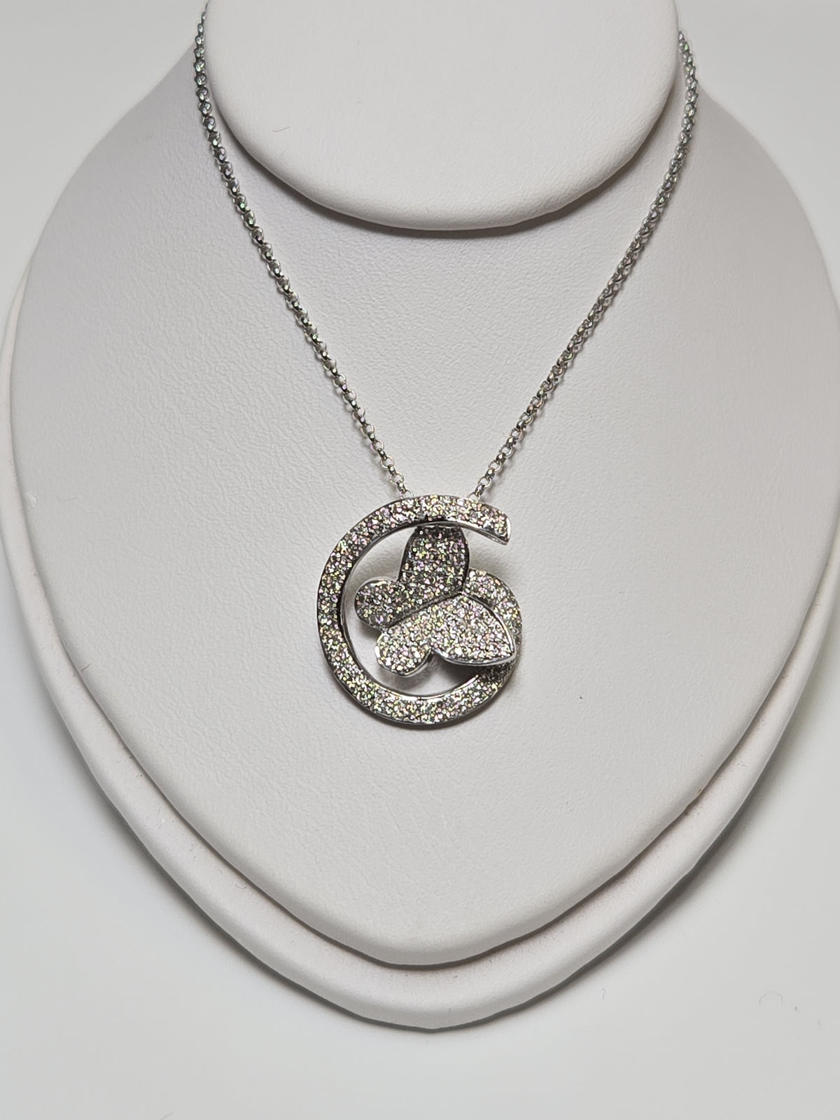14K white gold rolo chain necklace with butterfly pendant featuring 0.41ct round diamonds from Chique Jewelry