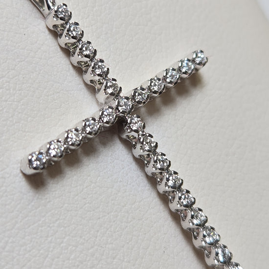 14K white gold cross pendant with 0.25ct round lab-created diamonds, featuring a delicate design from Chique Jewelry.