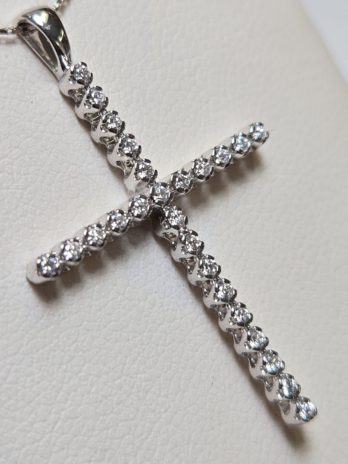 14K white gold cross pendant with 0.25ct round lab-created diamonds, featuring a delicate design from Chique Jewelry.