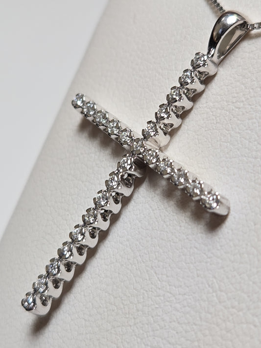 14K white gold cross pendant with 0.25ct lab-created diamonds, featuring a delicate design and weighing 1.6 grams.