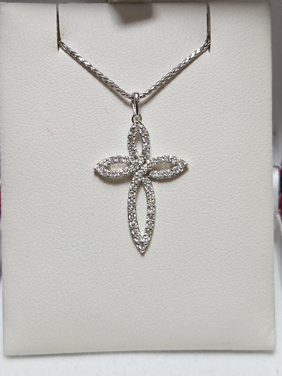 14K white gold cross pendant with 0.5ct lab-created diamonds, featuring a detailed design and polished finish by Chique Jewelry.