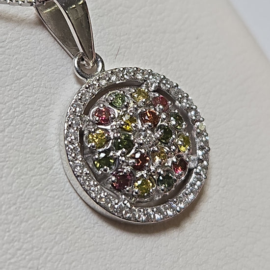 14K white gold pendant with 0.4ct round multicolor treated diamonds, weighing 2.5g, from Chique Jewelry.