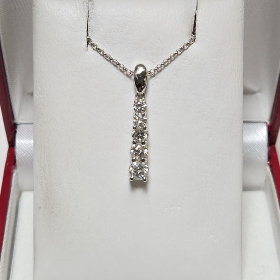 14K white gold pendant with 0.76ct round diamonds from Chique Jewelry, featuring a delicate and elegant design.