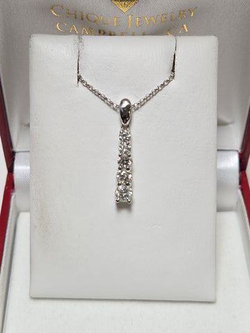 14K white gold pendant with 0.76ct round diamonds from Chique Jewelry, featuring a delicate and elegant design.