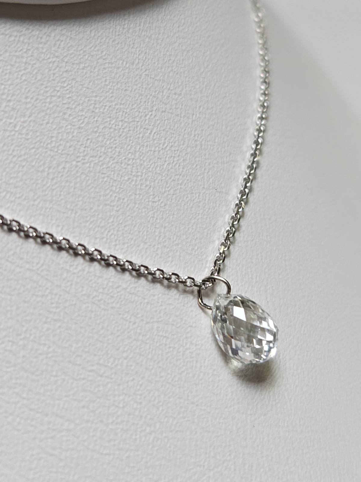 14K white gold pendant with a 1-carat briolette diamond, showcasing elegant jewelry design from Chique Jewelry.