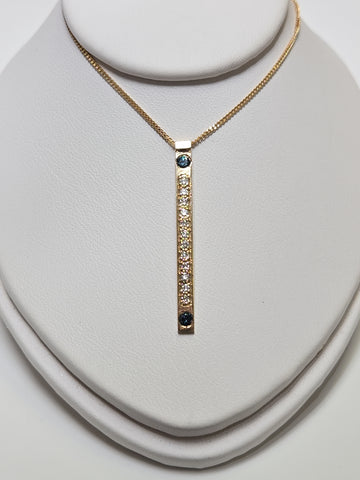 14K gold diamond cut curb chain necklace with blue treated diamonds, featuring a sleek pendant design by Chique Jewelry.
