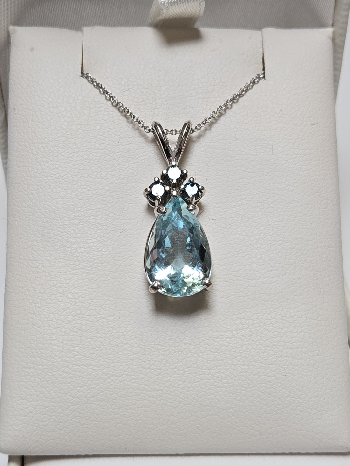 14K white gold pendant featuring a 4.77ct pear-shaped aquamarine gemstone, weight 3.4g, from Chique Jewelry.
