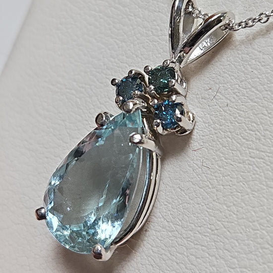 14K white gold pendant with a 4.77ct pear-shaped aquamarine gemstone, designed by Chique Jewelry, showcasing elegant craftsmanship.