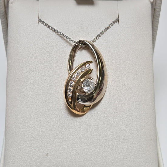 14K gold pendant with 0.53ct round diamonds from Chique Jewelry, showcasing elegant jewelry design and sparkling gemstones.