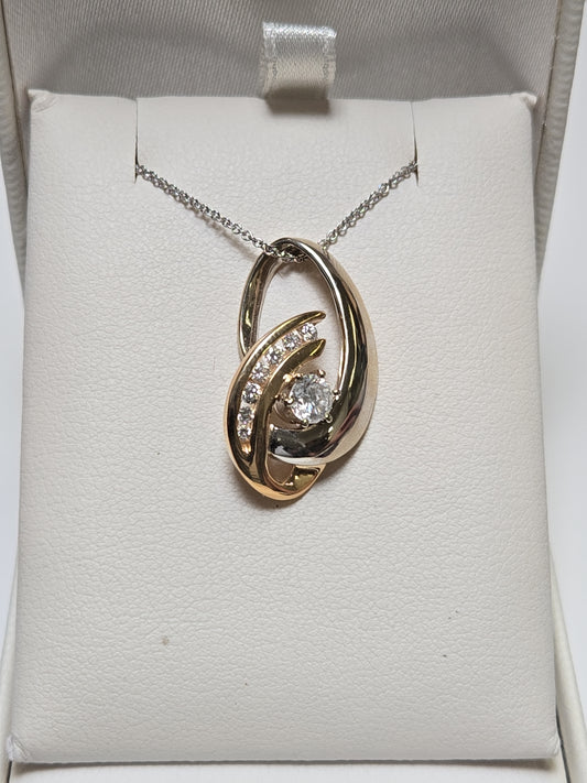 14K gold pendant with 0.53ct round diamonds from Chique Jewelry, showcasing elegant jewelry design and sparkling gemstones.