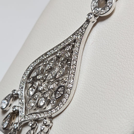 18K white gold diamond pendant with 1.2ct round diamonds from Chique Jewelry, featuring an elegant, polished design.