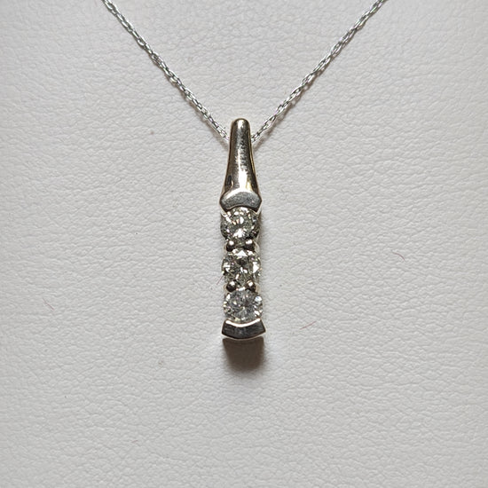 14K gold pendant with 0.5ct round diamonds from Chique Jewelry, showcasing a elegant, sparkling jewelry piece.