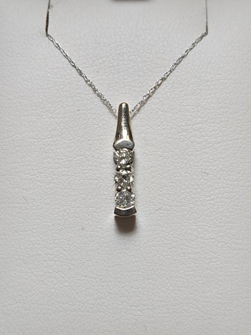 14K gold pendant with 0.5ct round diamonds from Chique Jewelry, showcasing a elegant, sparkling jewelry piece.