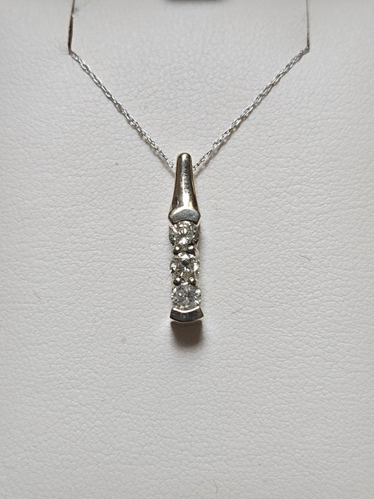14K gold pendant with 0.5ct round diamonds from Chique Jewelry, showcasing a elegant, sparkling jewelry piece.