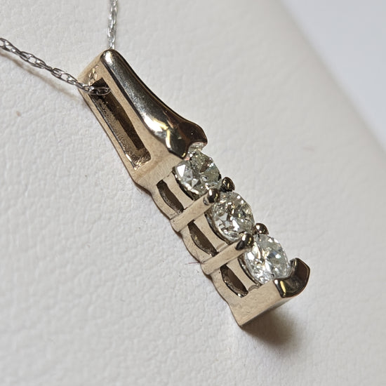 14K gold pendant with 0.5ct round diamonds from Chique Jewelry, showcasing elegant jewelry design and sparkling gemstone details.