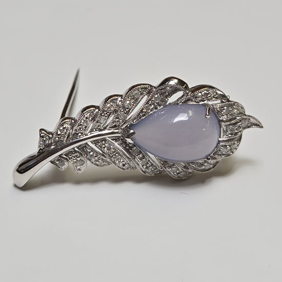 Pear-shaped lavender jade brooch in 14K white gold, designed by Chique Jewelry, weighing 6.7 grams.
