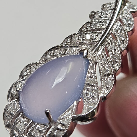 Pear-shaped lavender jade brooch in 14K white gold from Chique Jewelry, featuring elegant design and intricate craftsmanship.
