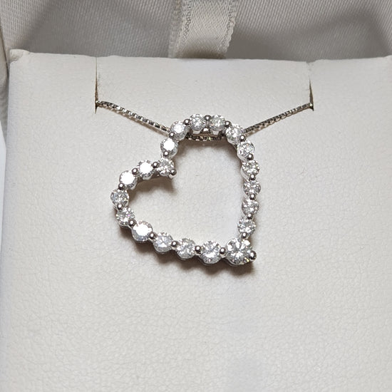 14K white gold pendant with 1.02ct round diamonds, showcasing a elegant jewelry piece from Chique Jewelry.