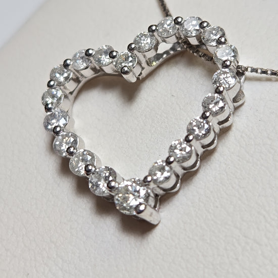 14K white gold diamond pendant with 1.02ct round diamonds, weighing 2.1g, from Chique Jewelry.