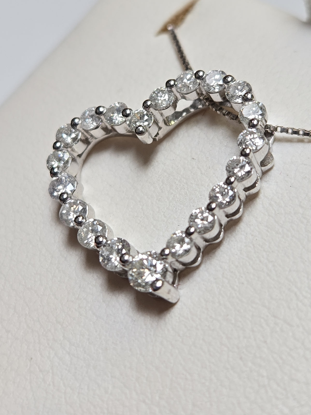14K white gold diamond pendant with 1.02ct round diamonds, weighing 2.1g, from Chique Jewelry.