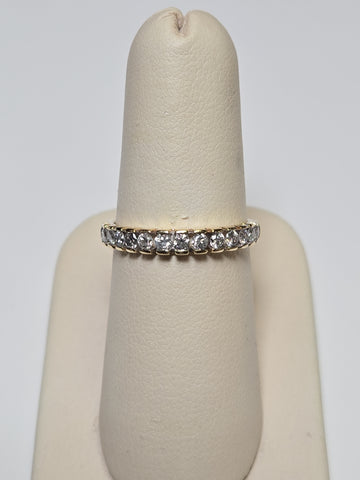 10K gold ring with 0.5ct round diamonds, elegant jewelry piece by Chique Jewelry, featuring a sleek design and sparkling stones.